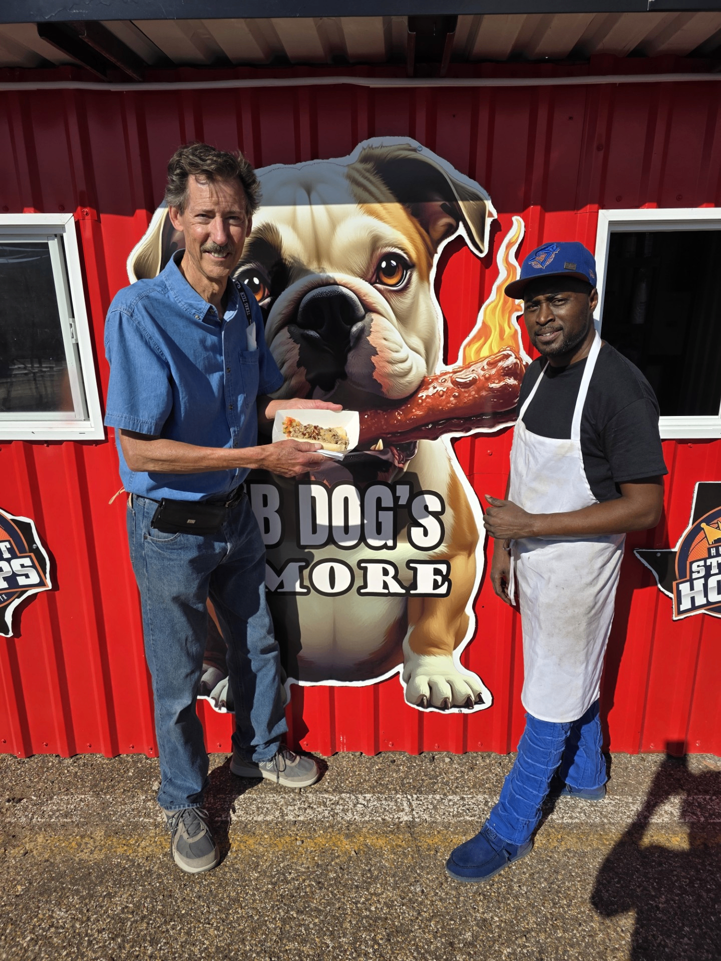 The Rib Dog's & More team in front of the truck